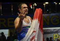  کمیل قاسمی مشترکا با کشتی گیر روسیه قهرمان المپیک ۲۰۱۲ شد